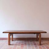 Large solid retractable coffee table