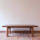 Large solid retractable coffee table