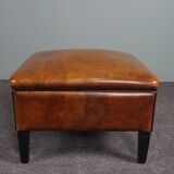 Schapenleren armchair and studio lounge stool