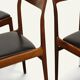 Set of 4 vintage teak and black faux leather chairs – 1960s