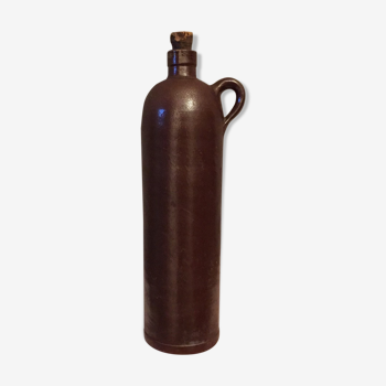 Brown sandstone bottle with cork