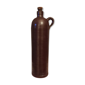 Brown sandstone bottle with cork