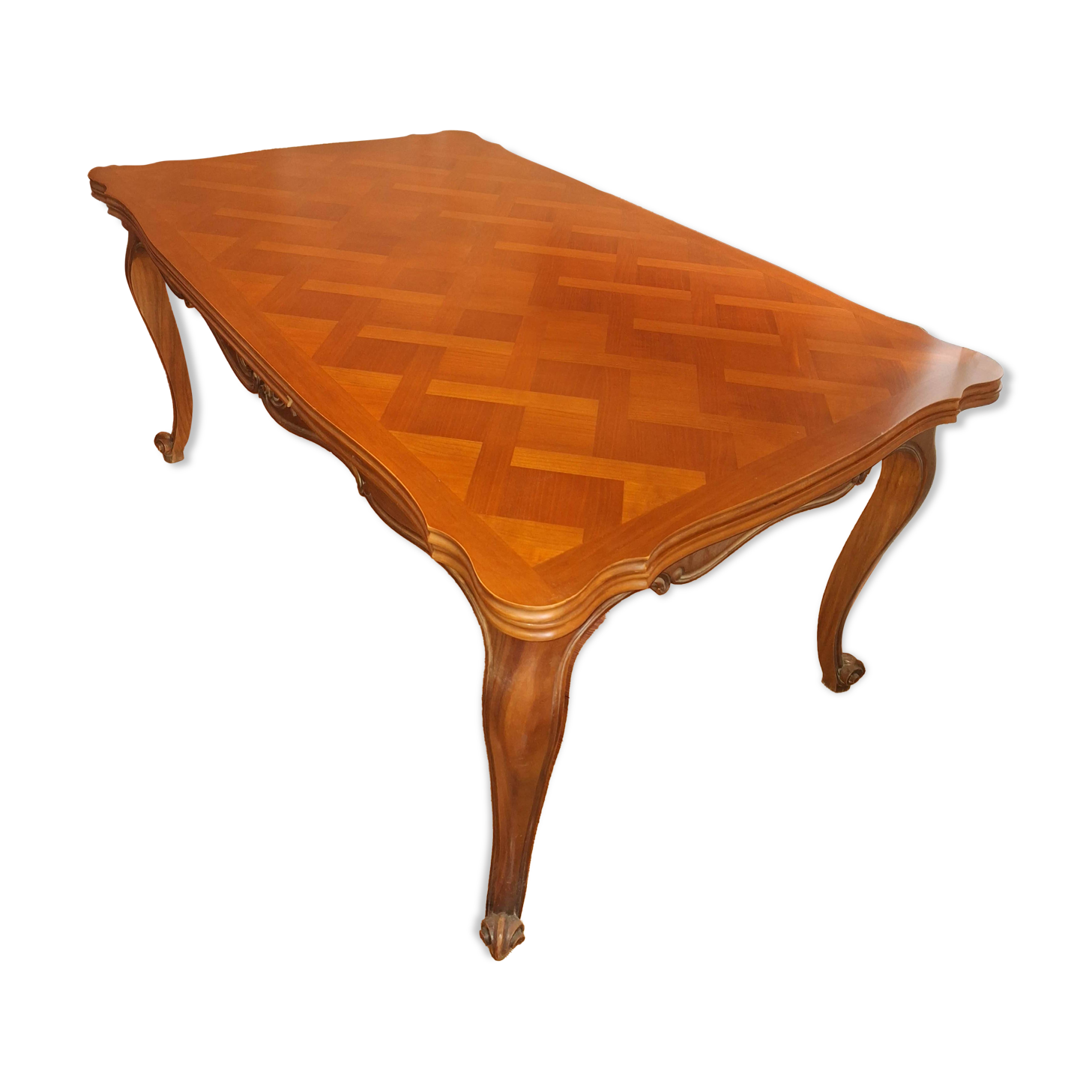 Extendable table in Louis XV style made of solid cherry wood and marquetry.
