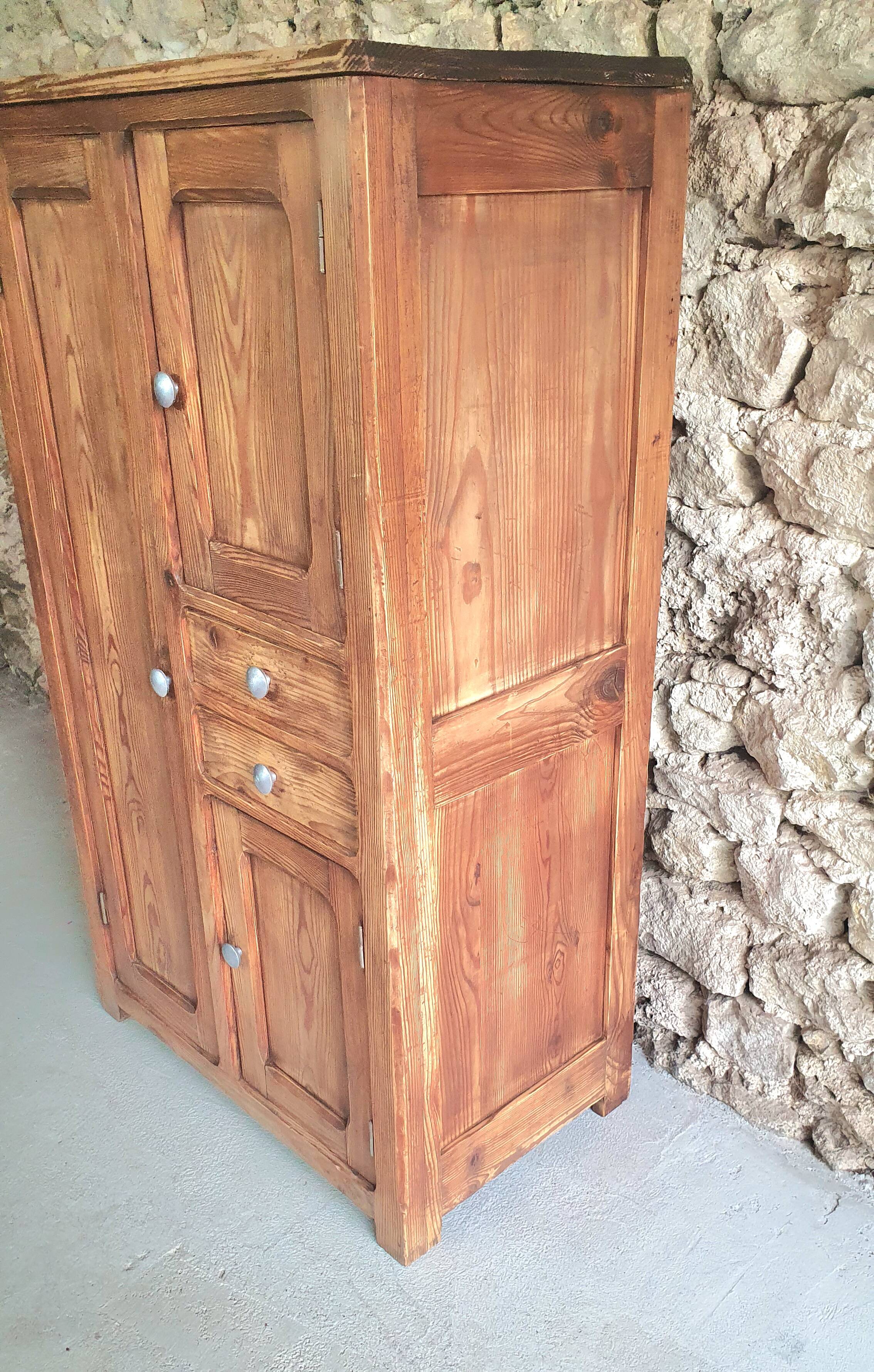 Small cabinet made of raw wood