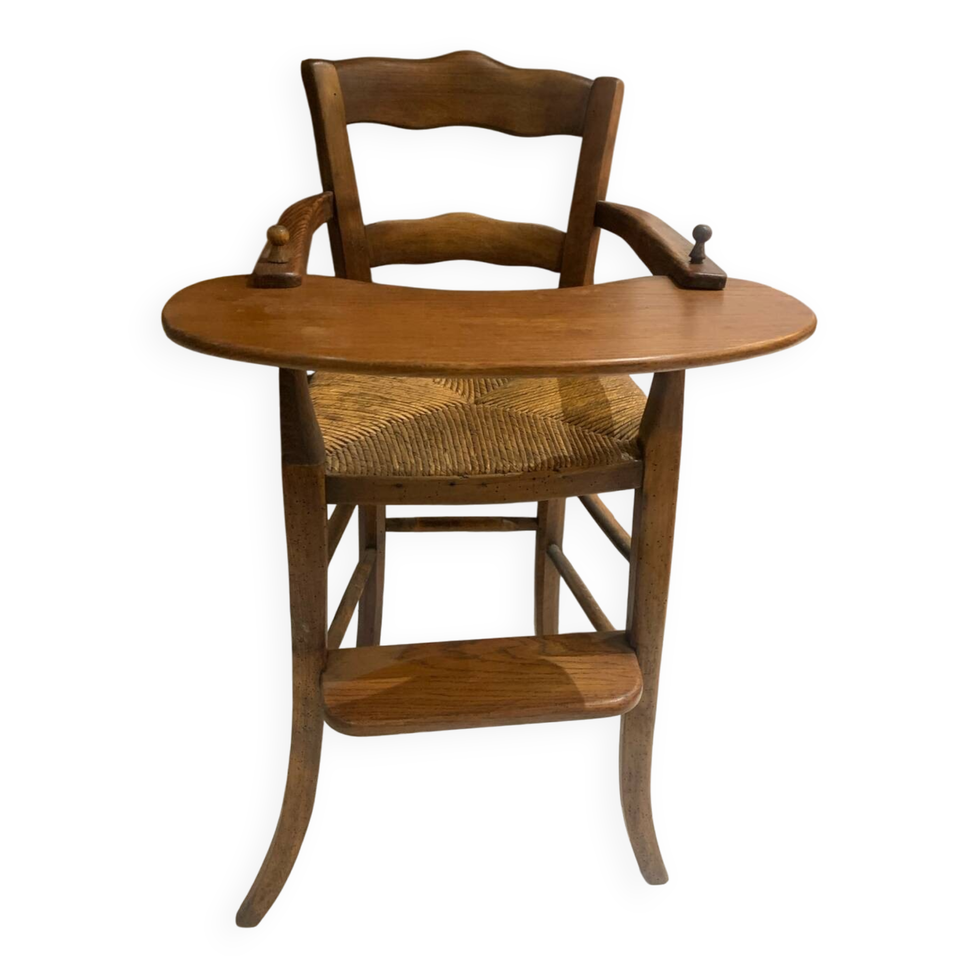Antique straw-covered high chair