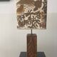 Wooden lamp with carved plant decoration from 1930-50, sold with a 1970 lampshade.