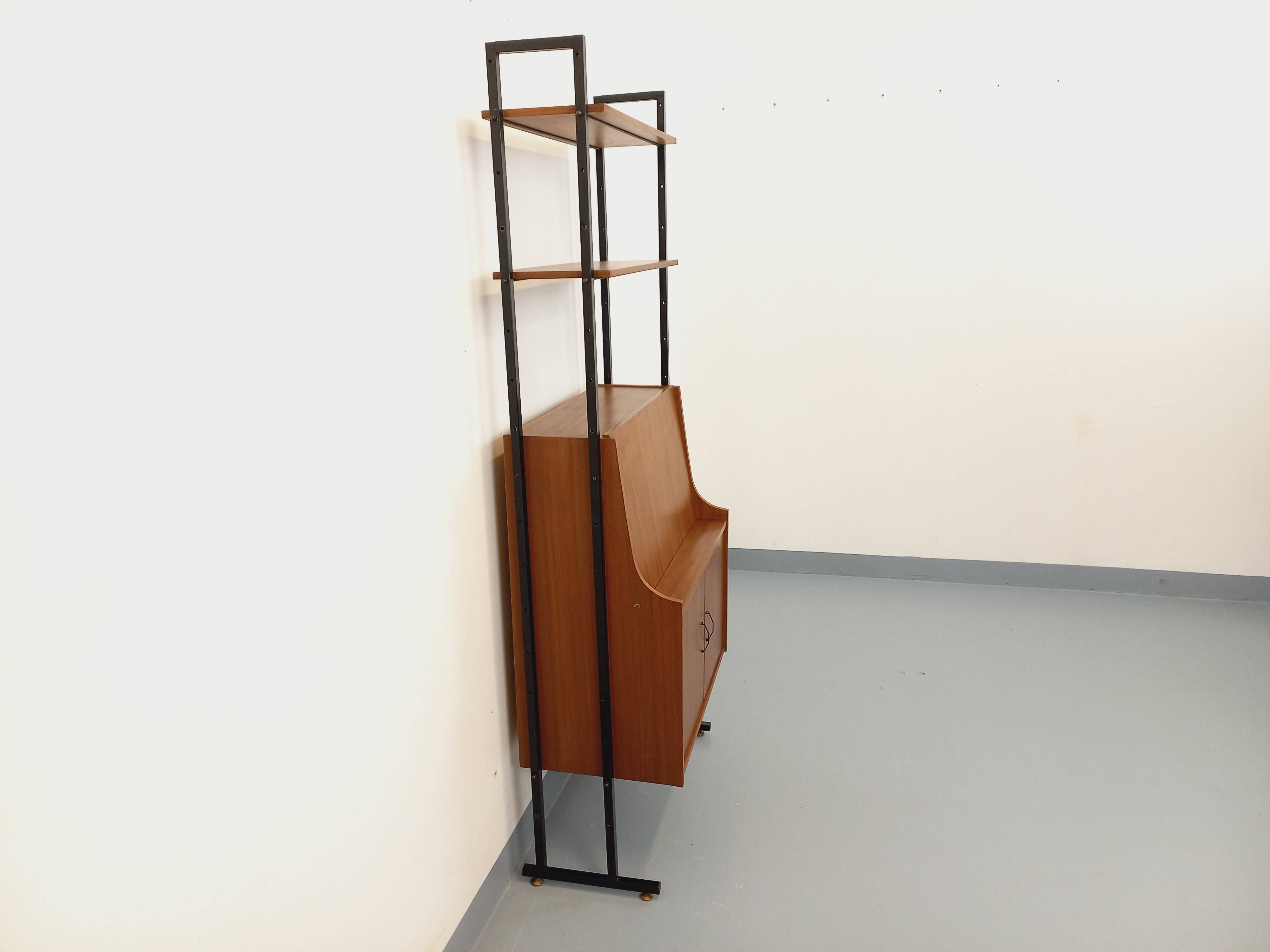 Vintage modular secretary bookshelf in teak and metal.