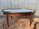 Table basse bouillotte de style Louis XVI à oreilles