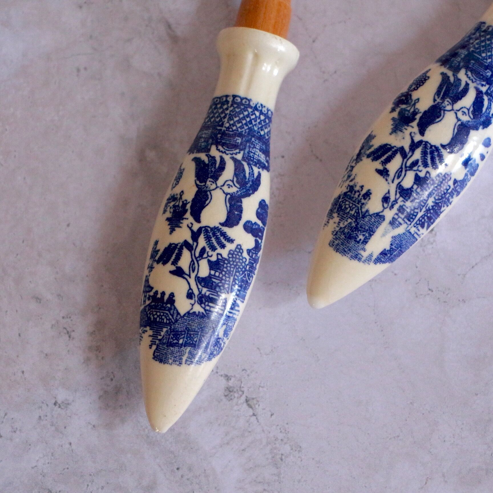 Set of wooden and ceramic salad cutlery