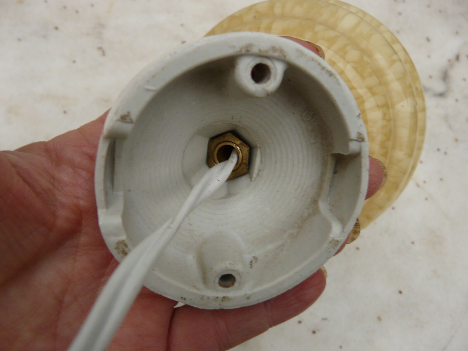 art deco wall light in porcelain and yellow glass