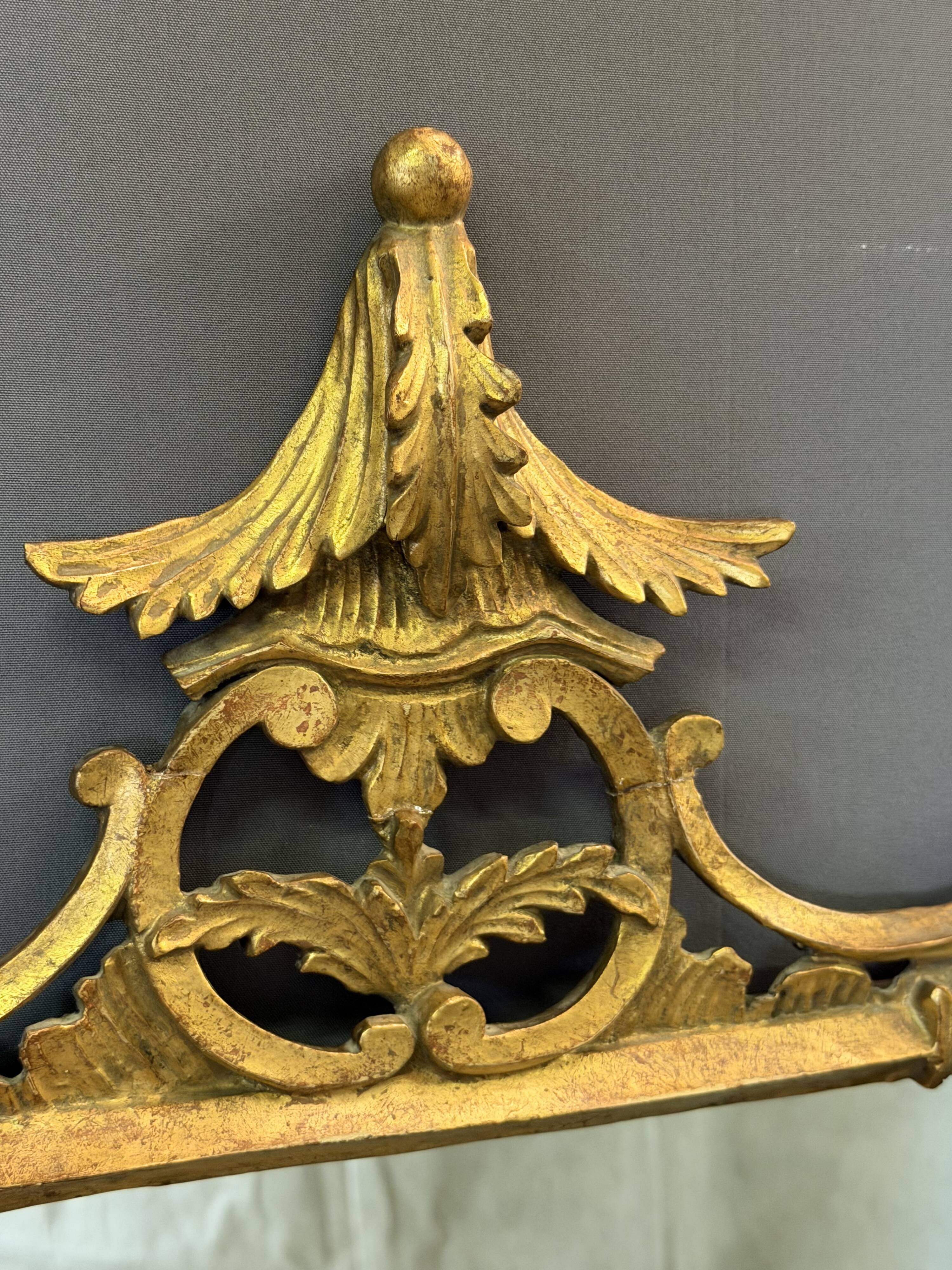 Italian mirror in gilded wood from the 19th century.