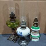 set of three old kerosene lamps