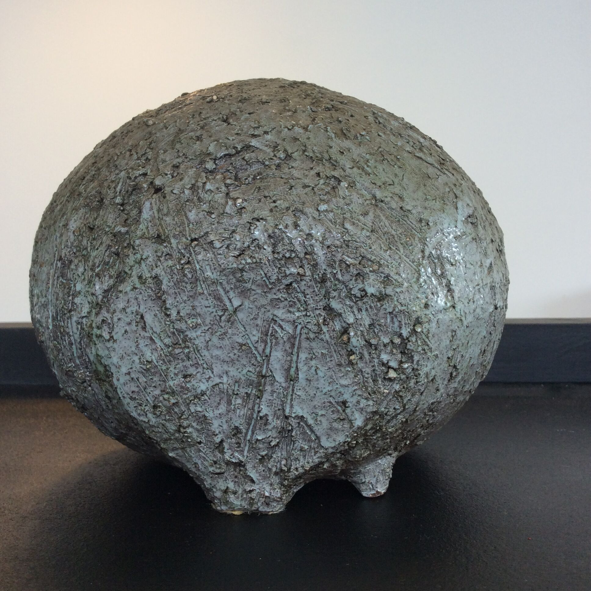 Empty pocket on vintage ceramic stand