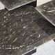 Set of 3 marble and lacquer coffee tables, 1970s.