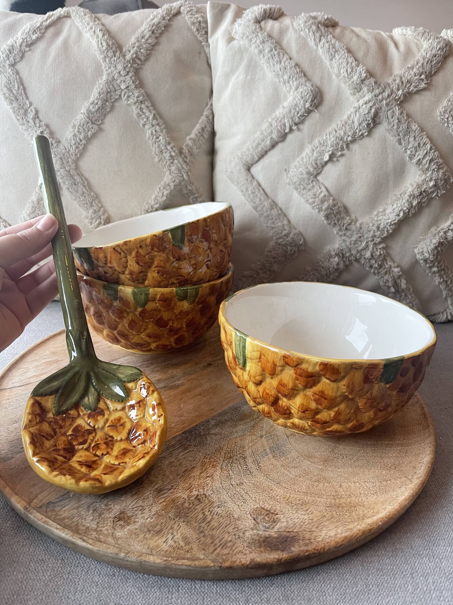 Old set of bowls and spoons in the shape of vintage pineapple