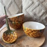Old set of bowls and spoons in the shape of vintage pineapple