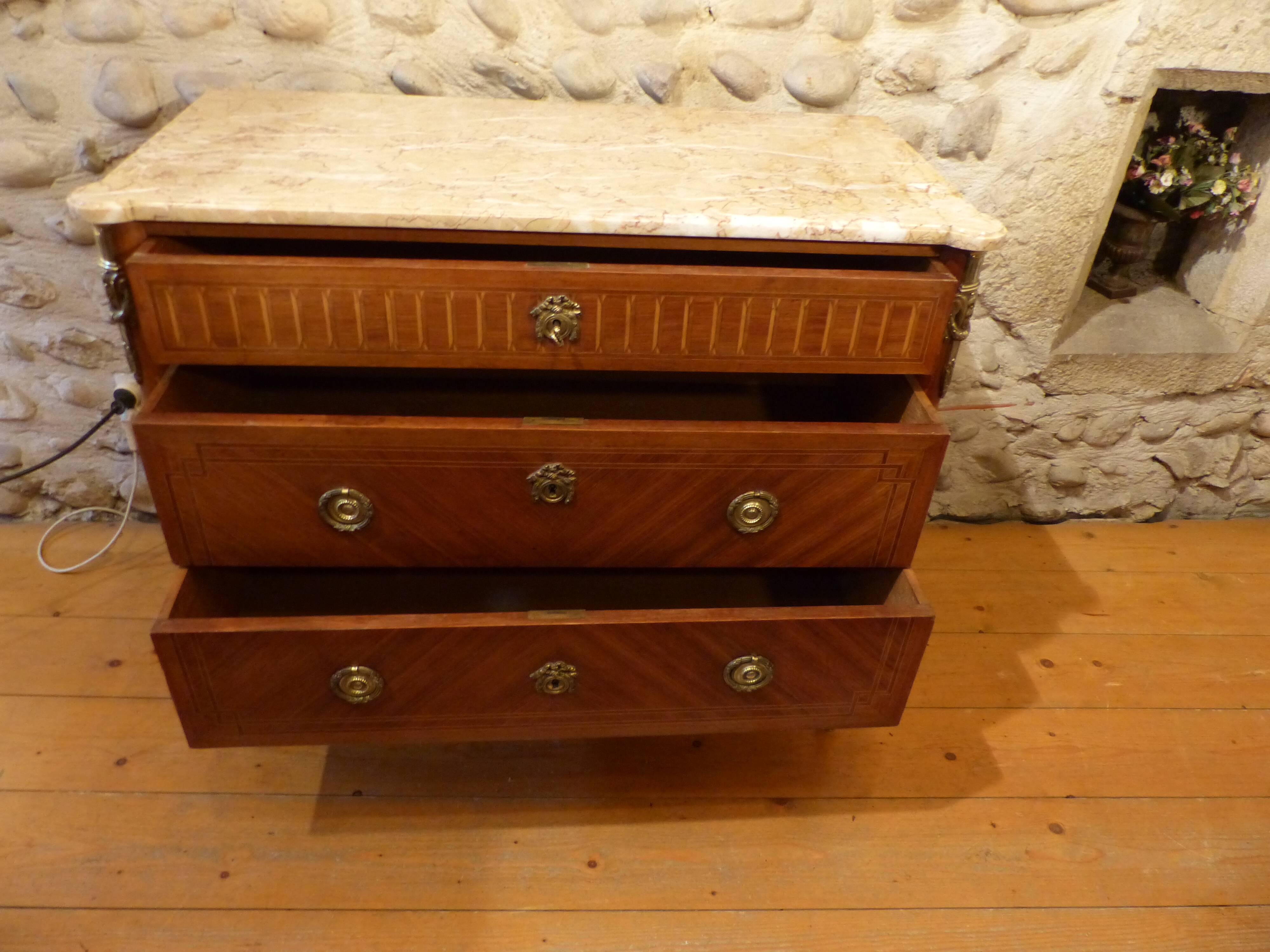 Louis XVI-style dresser marked on marble