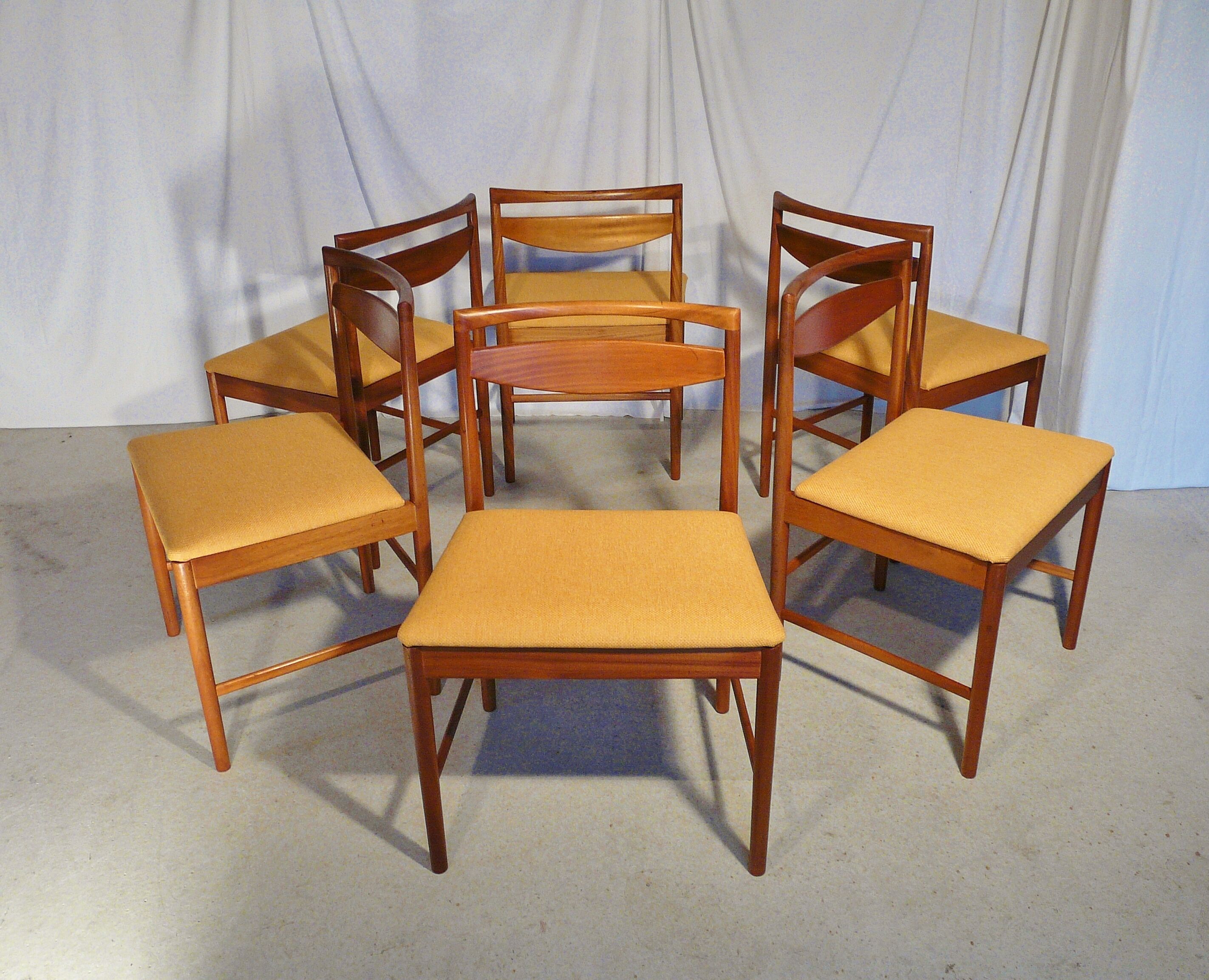Extendable table set and six Scandinavian Teak Mc Intosh chairs