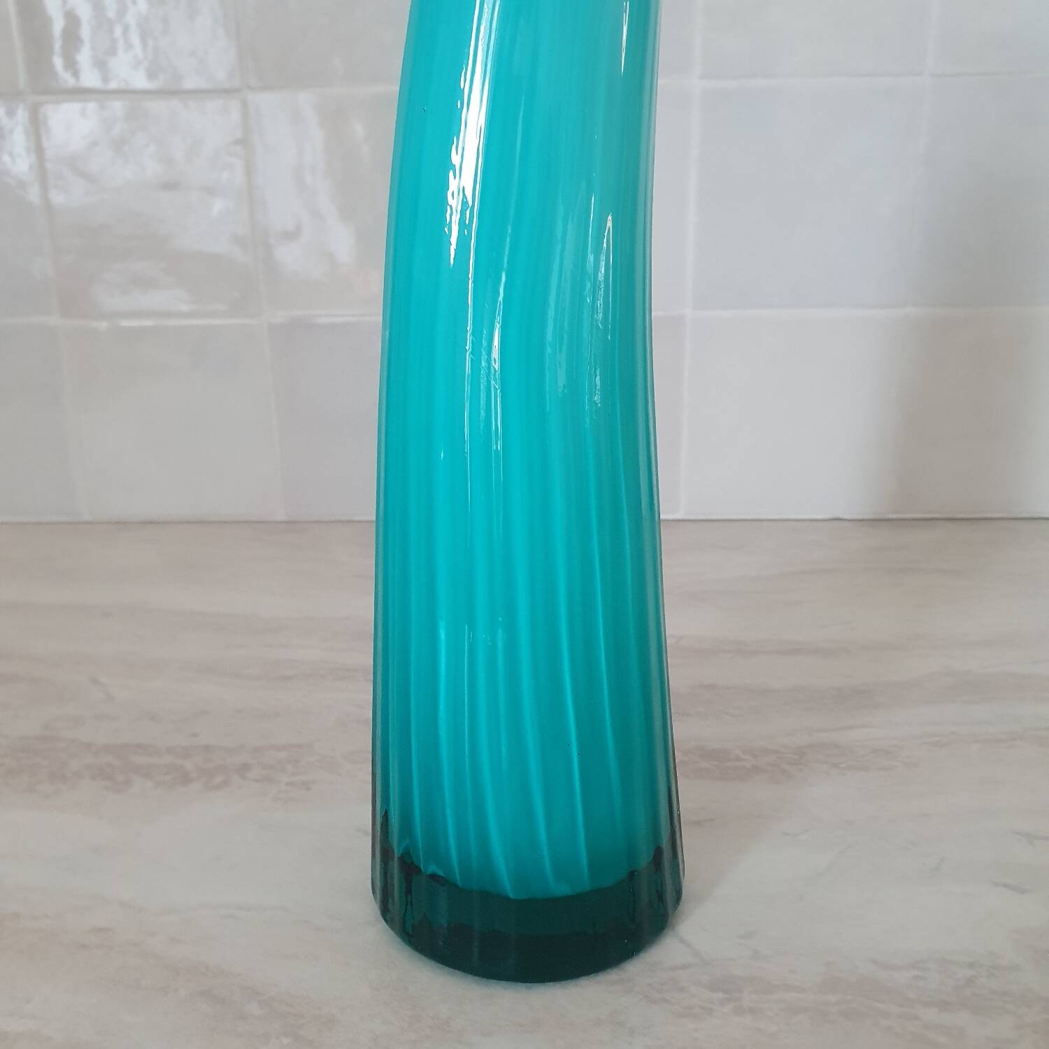 Curved turquoise blue blown glass soliflore vase