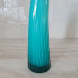 Curved turquoise blue blown glass soliflore vase
