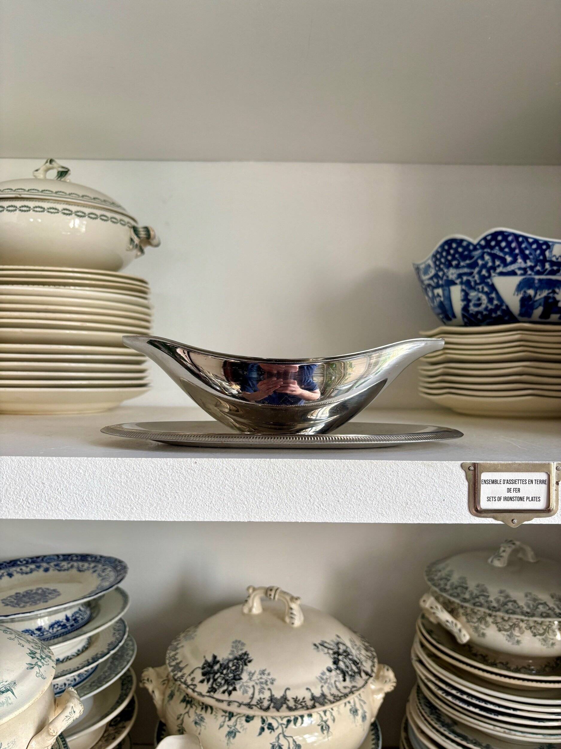 Silver stainless steel gravy boat