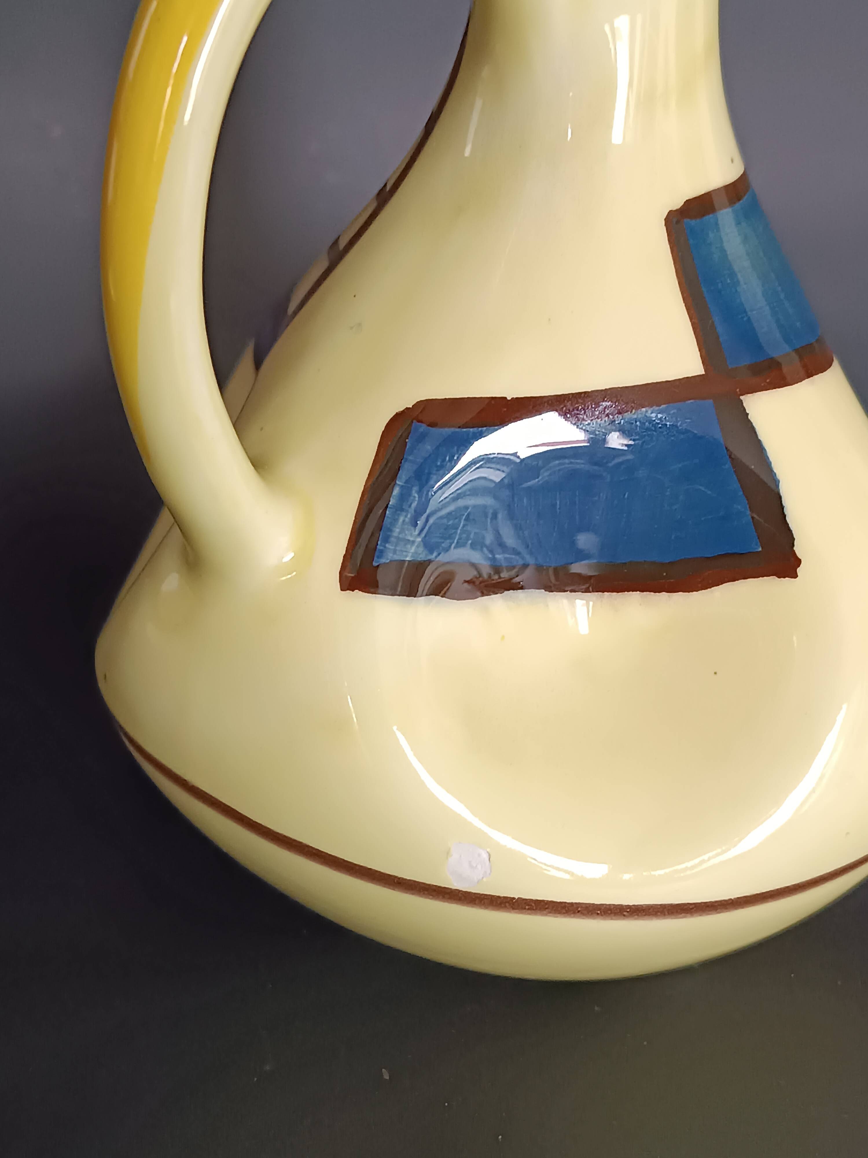 Ceramic carafe bottle designed by Eva Zeisel for Schramberg 1928