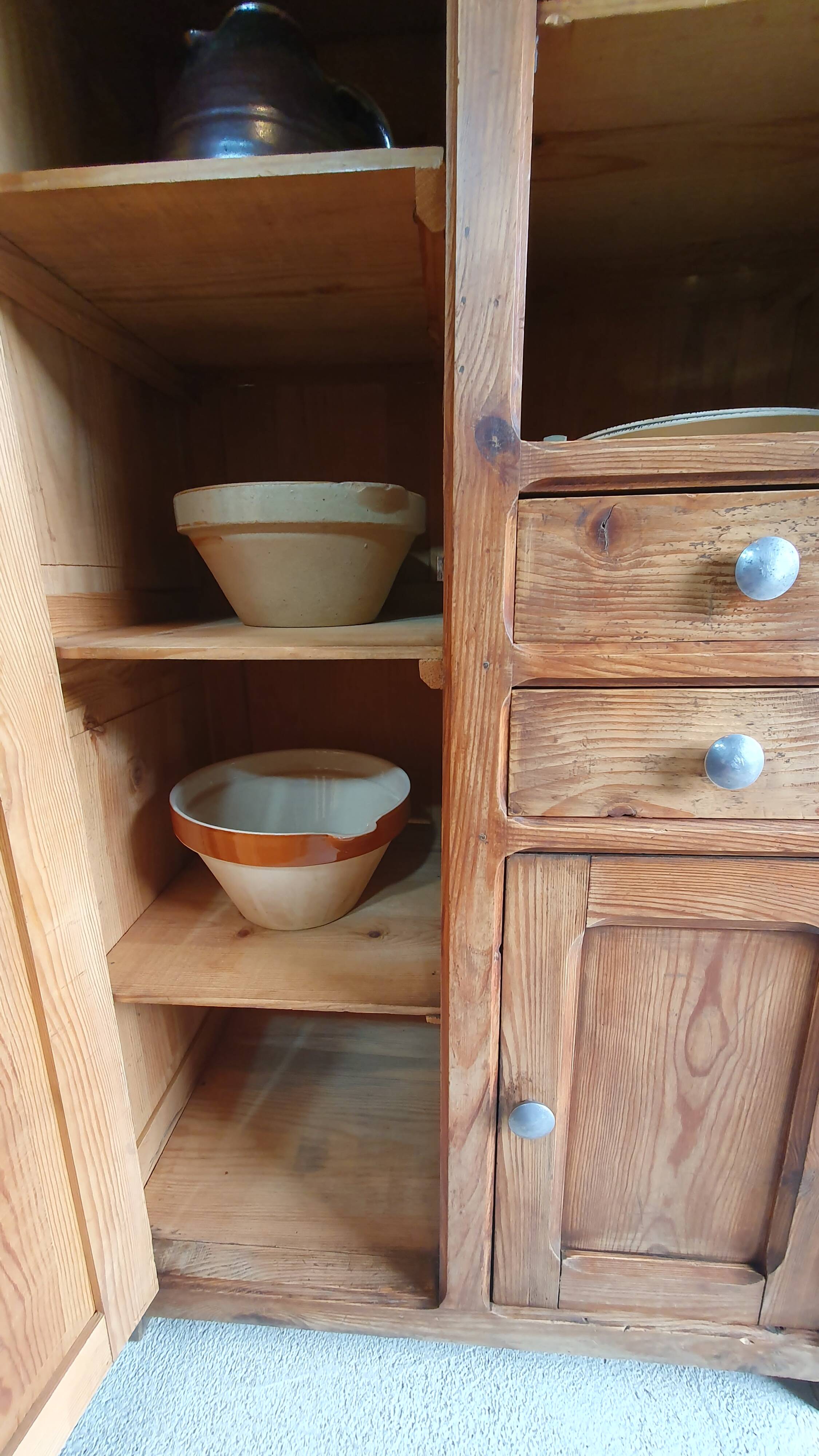 Small cabinet made of raw wood