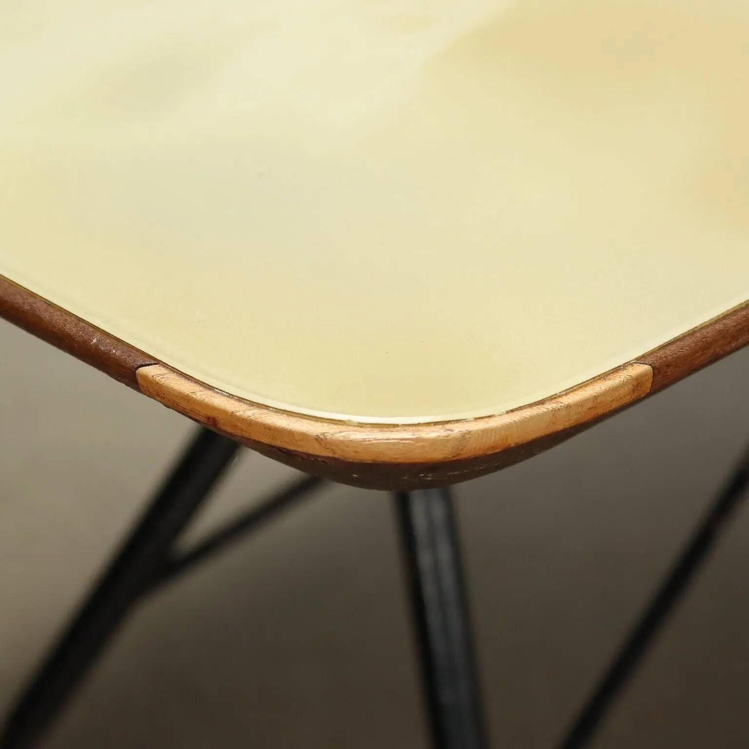 1960s vintage table made of wood and metal with a glass top, Italy.