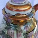 Porcelain teapot with Japanese decoration