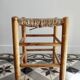 Vintage low stool in wood, honey yellow tones – Woven seat