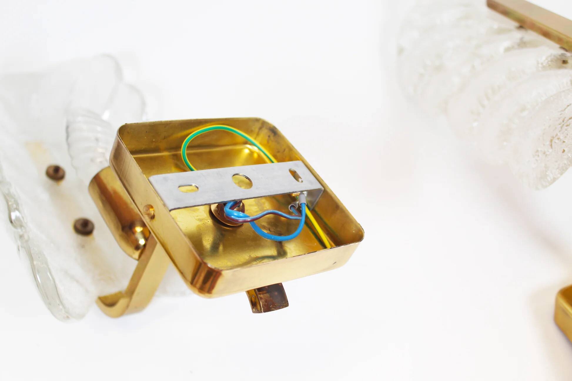 Pair of brass and glass wall lamps by Carl Fagerlund for Orrefors