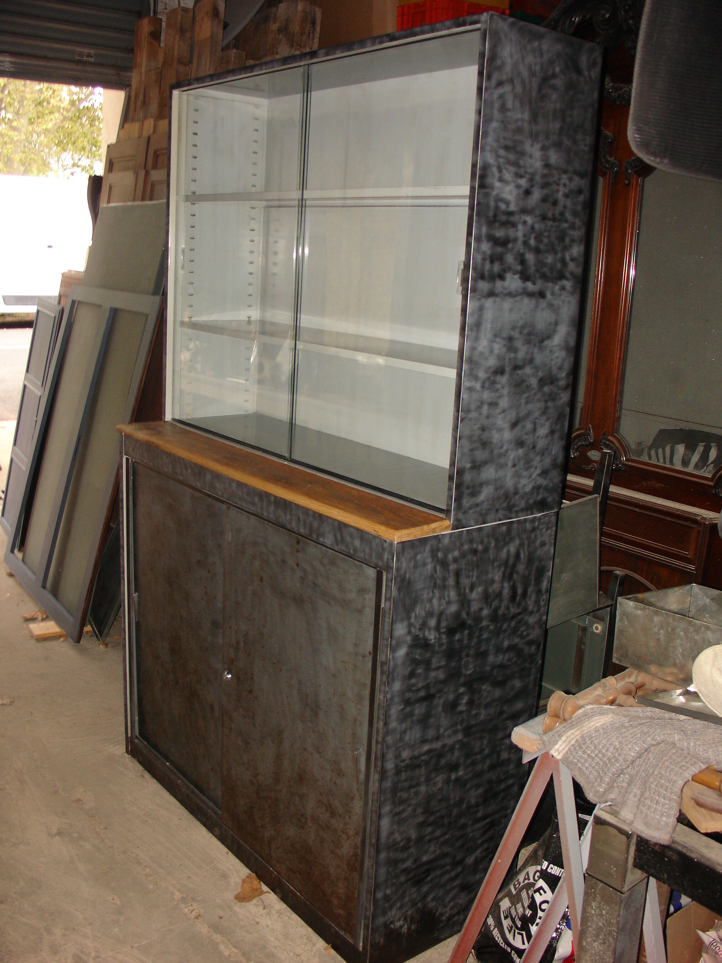 Buffet or Bookcase 2 bodies in polished and varnished steel circa 1960