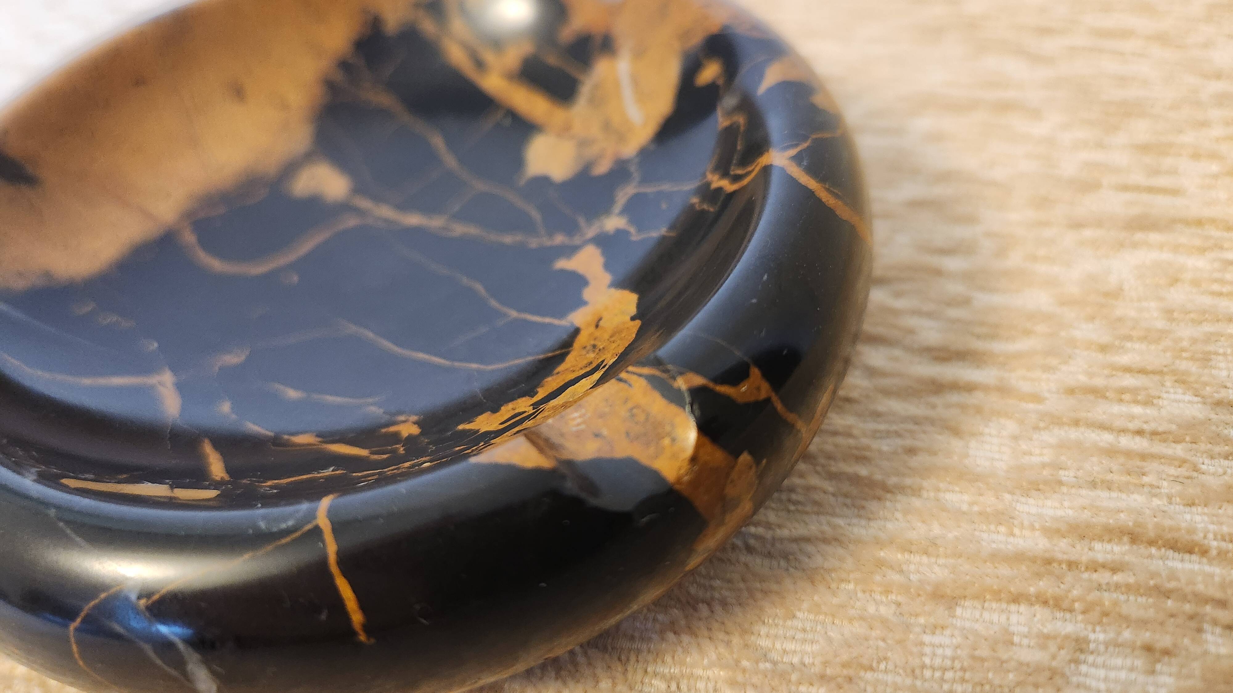 Vintage round ashtray in Italian black and gold Portoro marble.