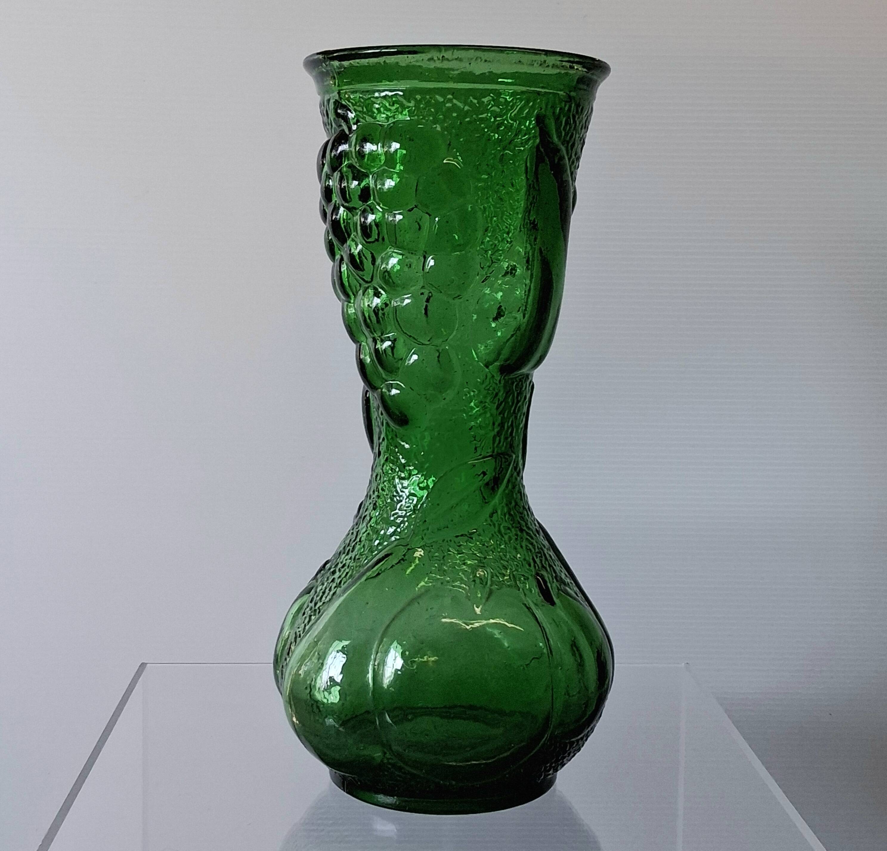 Vintage green glass vase with a fruit design in very good condition.