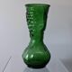 Vintage green glass vase with a fruit design in very good condition.