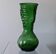 Vintage green glass vase with a fruit design in very good condition.