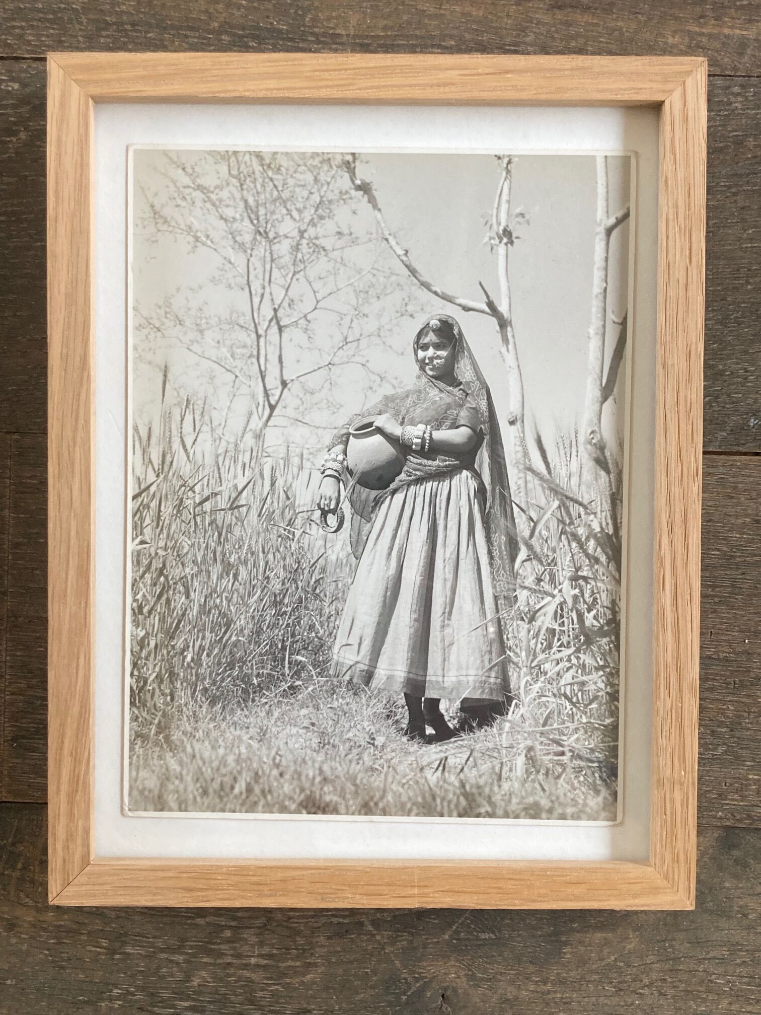 Original photograph by Suraj N. Sharma: young woman and amphora
