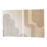 Beige and white relief diptych panels