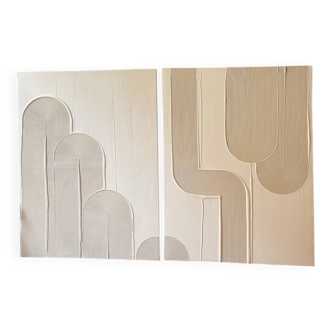 Beige and white relief diptych panels