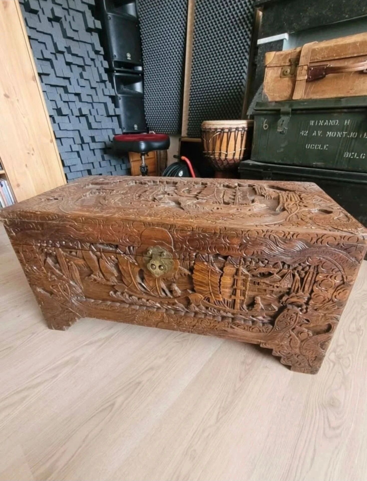 Carved chest in Asian camphor wood, chinoiserie boat decoration.