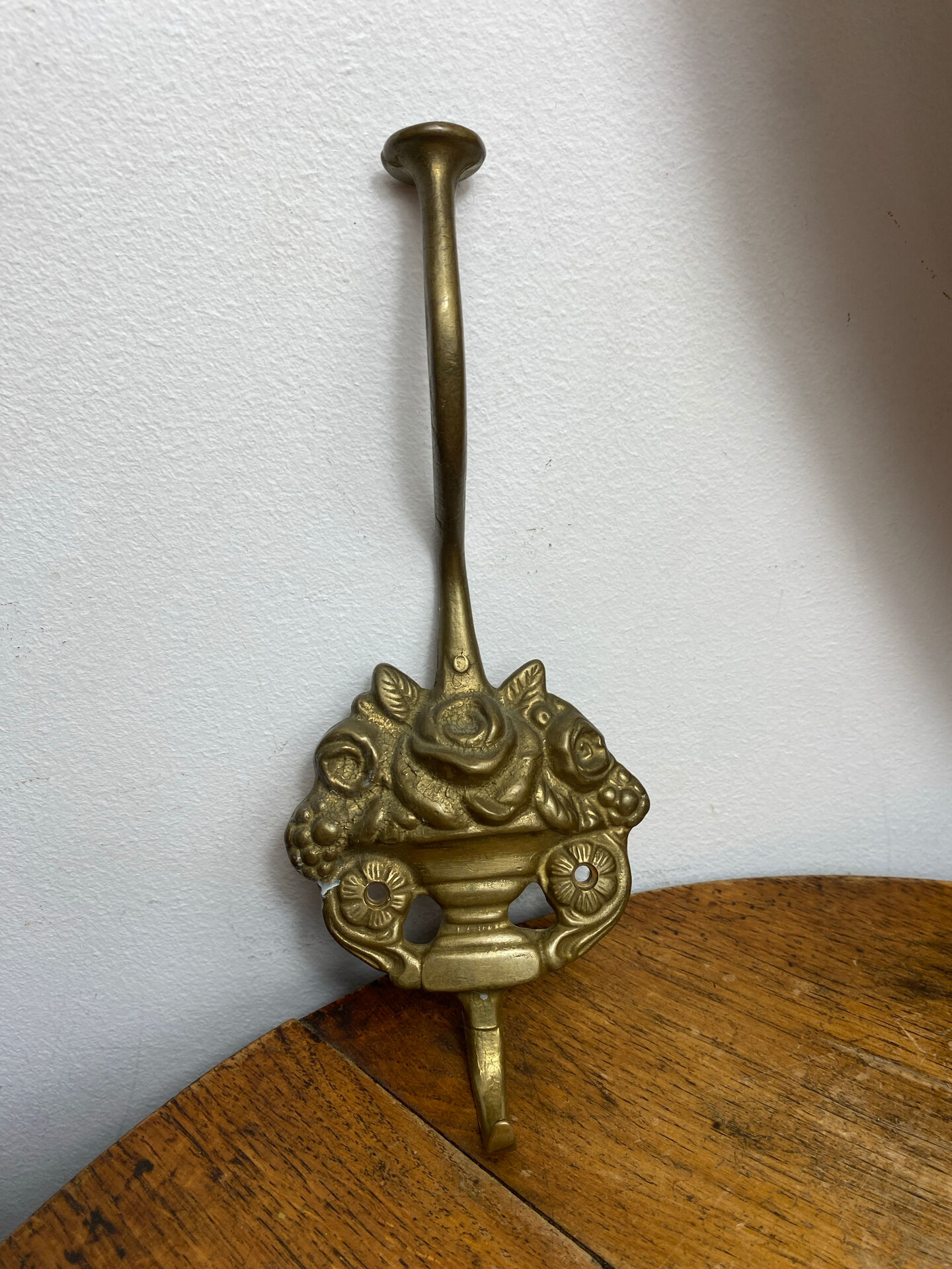 Wall-mounted brass hook