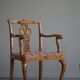 A pair of English Chippendale style armchairs in birch, 20th century, England.