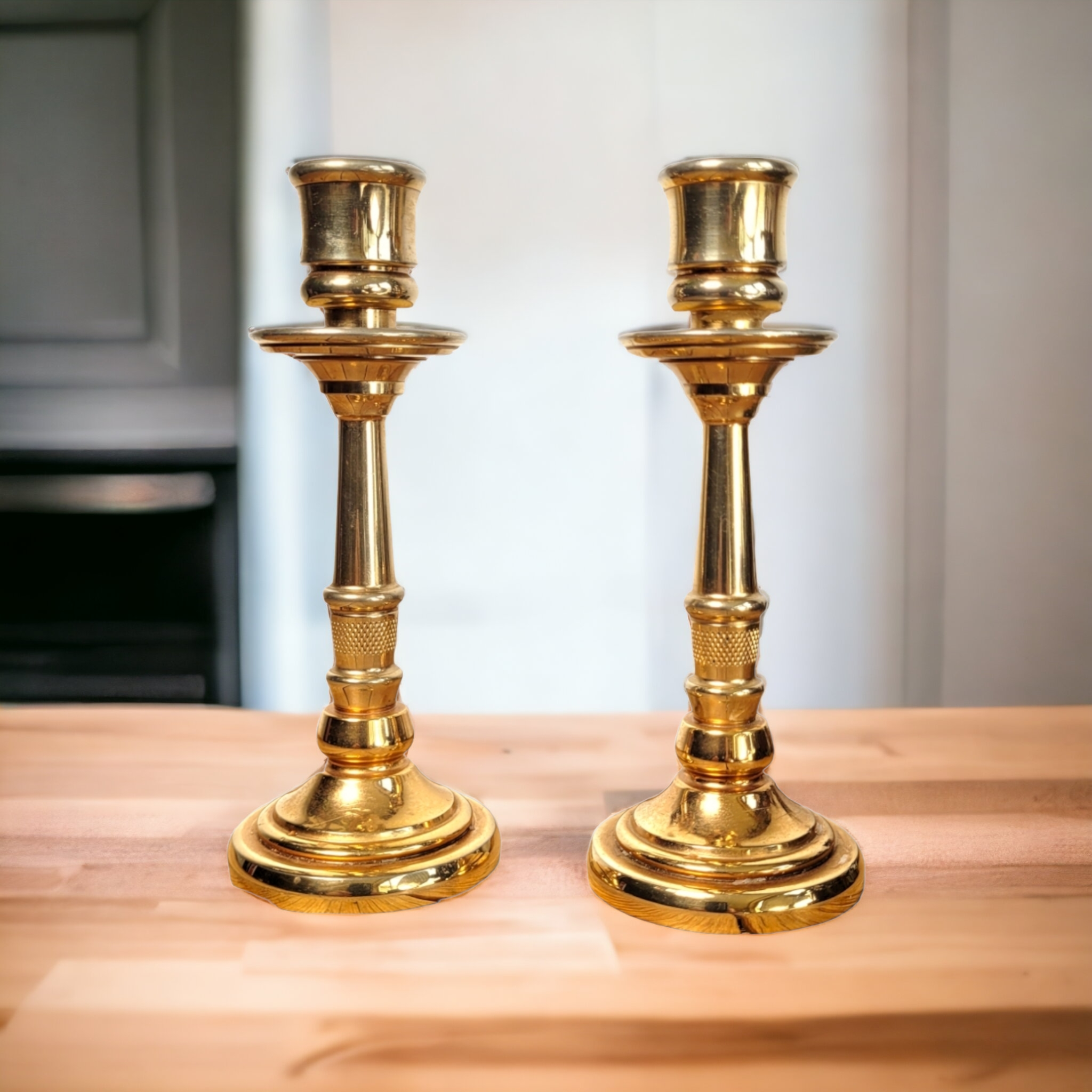 Pair of candle holders in solid gilded metal