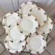 Lot de 7 assiettes plates Terre de Fer modèle "Romeo" début XXème