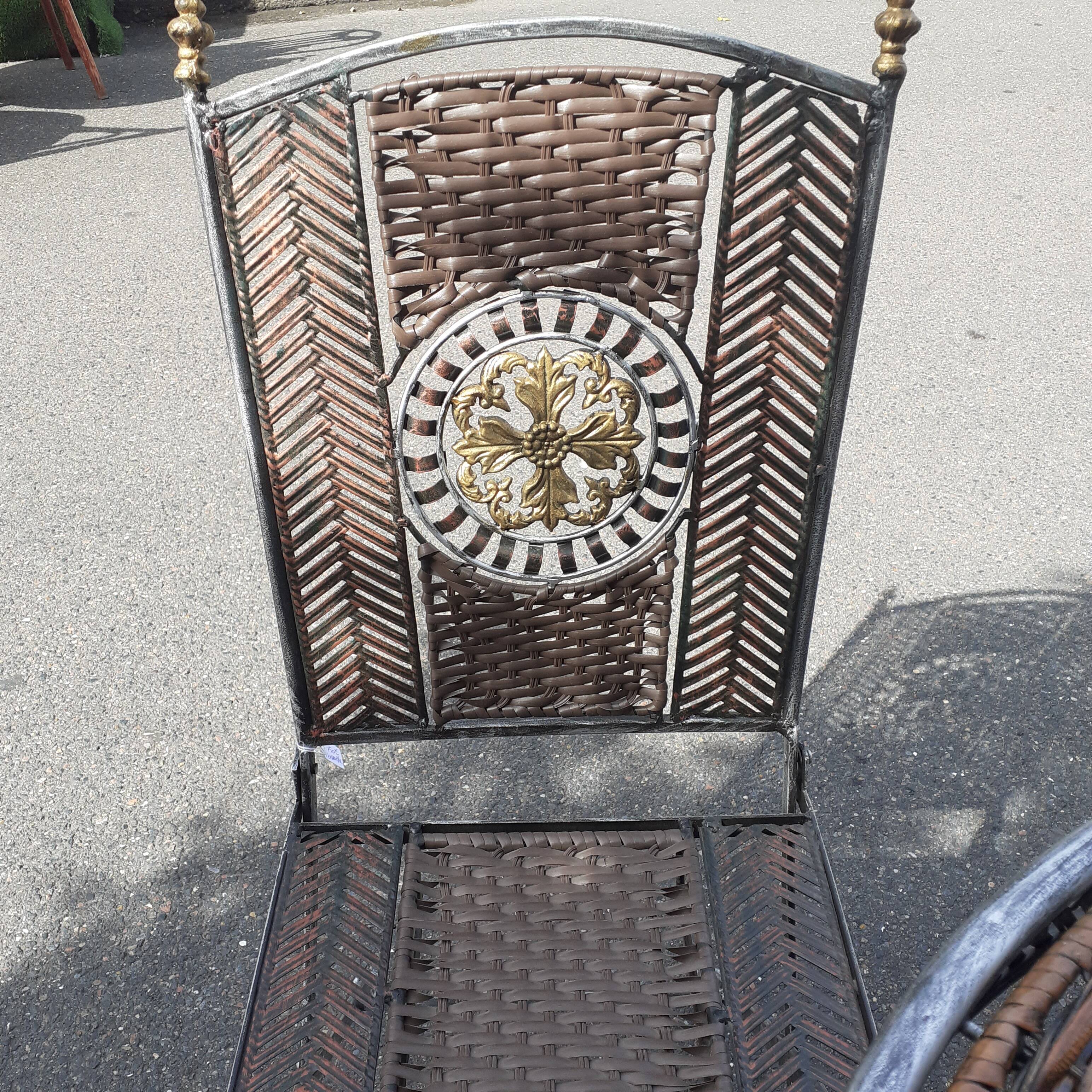Garden furniture in rattan and wrought iron