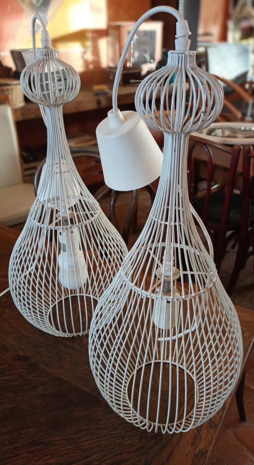 Pair of white metal pendant lights