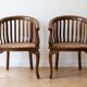 Pair of antique wooden and caned armchairs
