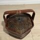 Ancient wooden and woven wicker basket,