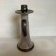 Stoneware candlestick in Bouffioulx style with a crest.