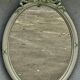 miroir ovale en bois peint style Louis XVI